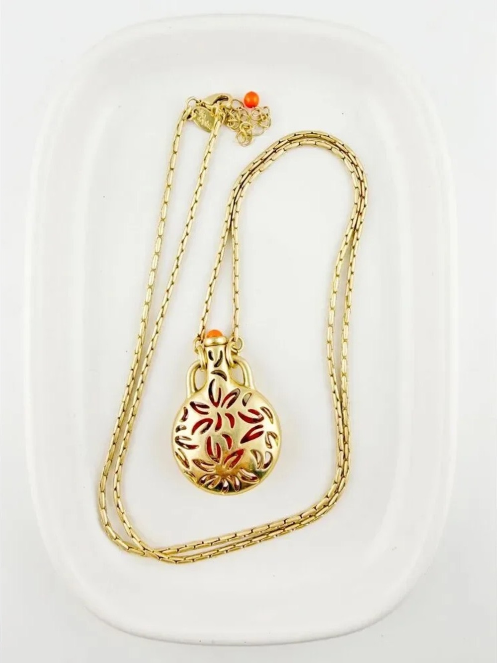 Lia Sophia Gold-Tone Floral Cutout Pendant Necklace with Red Accent